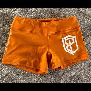 Orange born primitive shorts